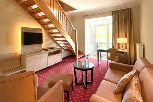 großzügige Suite im 2.OG des Hotels Westfalia mit Balkon